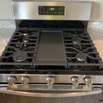 This built in griddle on top of the gas stove at Ridgecrest Townhones is perfect for making pancakes.